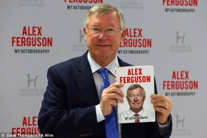Ferguson holds up his book